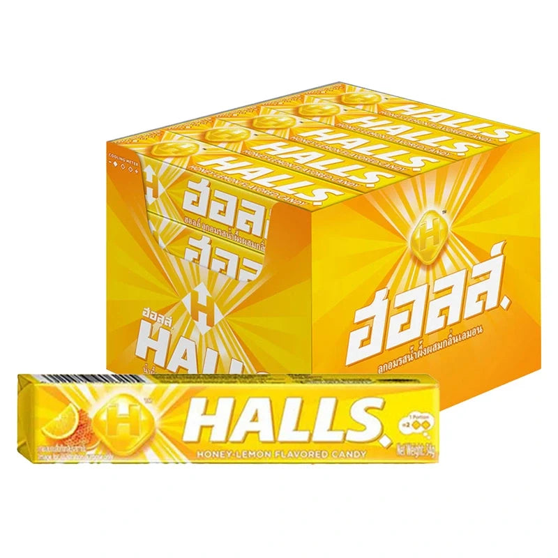 Halls Honey Lemon cough drops in a 20-piece package, HALL'S brand dry grocery snack confectionery, close-up of the product packaging