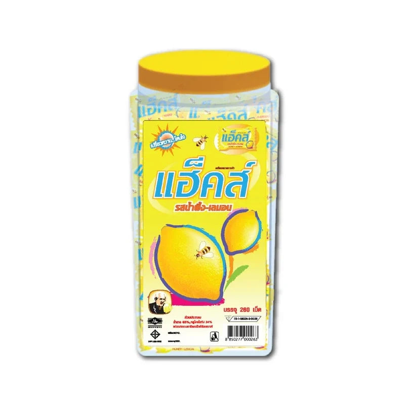 Hacks Candy Honey Lemon 702g box of dry grocery snacks with lemon-flavored candies in colorful packaging.