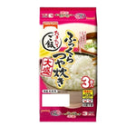 Bag of Tablemark Fukkura Tuyadaki Oomori Gohan Japanese Uruchi rice for cooking, dry grocery product with rice grains visible in the bag.