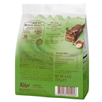 Kagi Hazelnut Mini confectionery snack featuring small, crunchy hazelnut pieces in a sweet, chocolate-coated treat.