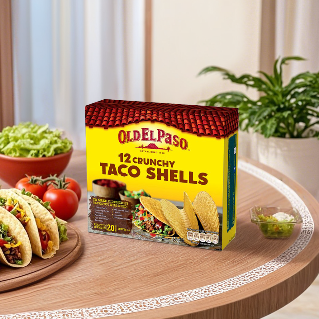 Old El Paso taco shells in a grocery bag, ready for making tacos, with crispy, golden-brown corn taco shells visible.