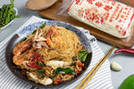 White Chinese noodles by Rabbit Brand, 1kg package of dry grocery rice noodles, ready for cooking and stir-fry dishes.
