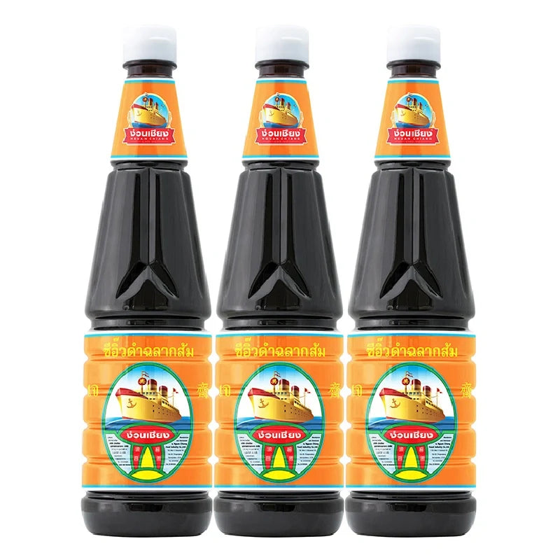 Nguan Chiang dark soy sauce 940g bottles, packaged in a set of three, ideal for Asian cooking and culinary uses.