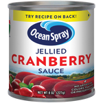 Canned Ocean Spray Jellied Cranberry Sauce in a can with red jelly and label visible, ideal for holiday meals and garnishes.