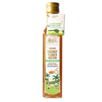 Organic coconut flower nectar from Happy Mate, showcasing the natural syrup in a clear container with a golden hue.