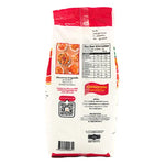 UFM Crispy Flour 1kg, dry grocery product, close-up of the golden, finely milled flour in a clear bag.