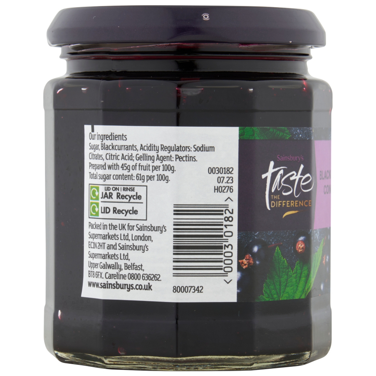 Jar of Sainsbury's Taste The Difference blackcurrant conserve with fresh blackcurrants visible inside the glass jar.