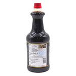 Kikkoman Soy Sauce 1.6L bottle, traditional Japanese soy sauce in clear plastic container, ideal for cooking and seasoning.