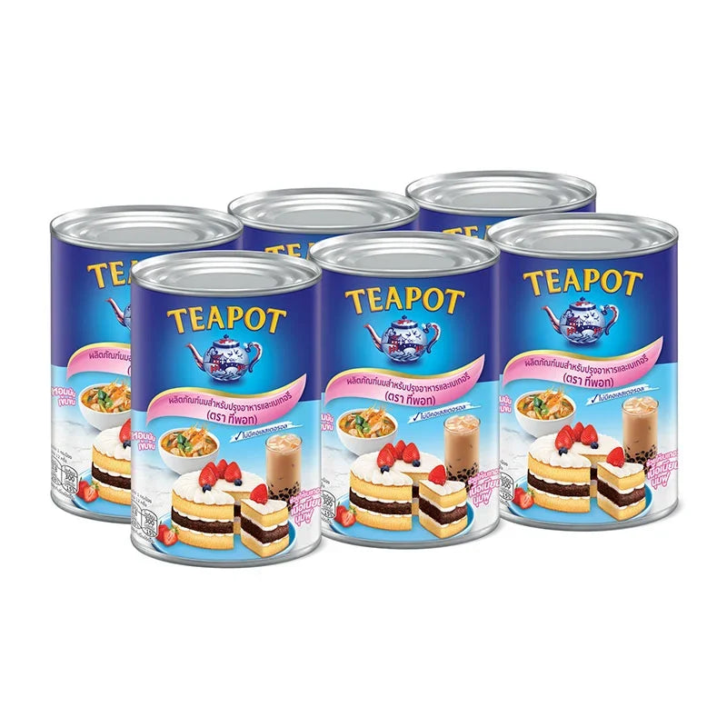 TEAPOT dry grocery milk powder in six 385g packages, suitable for baking and cooking, shown in the image.
