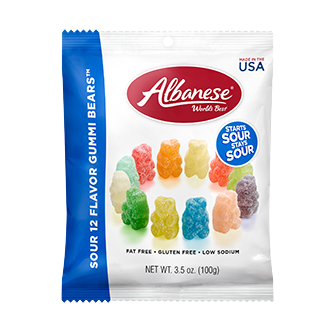Albanese Sour 12 Flavor Gummi Bears in a clear bowl, colorful confectionery snacks with assorted fruit flavors and chewy texture