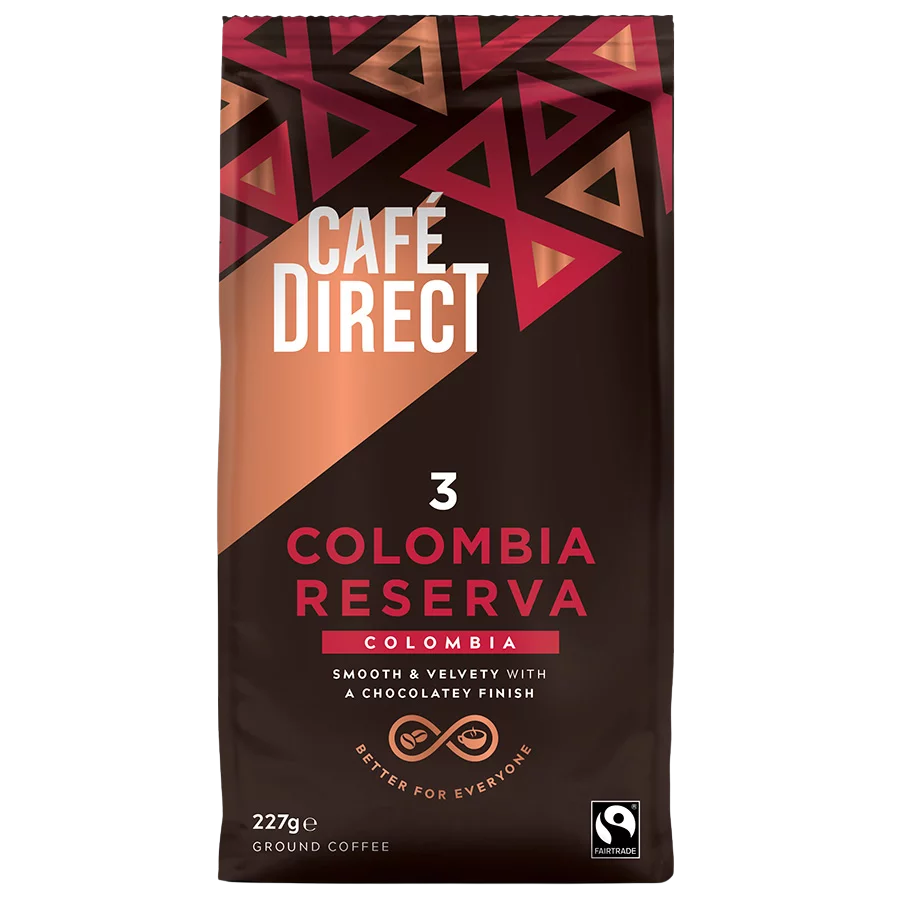Cafedirect Cauca Colombia ground coffee for brewing, showing fresh coffee grounds in a bag.