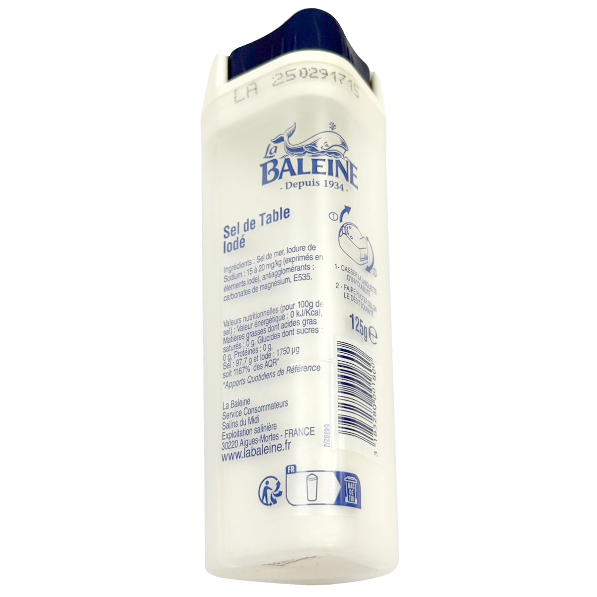 Fine sea salt by La Baleine, in a clear container, showing the white crystalline salt used for cooking and seasoning.