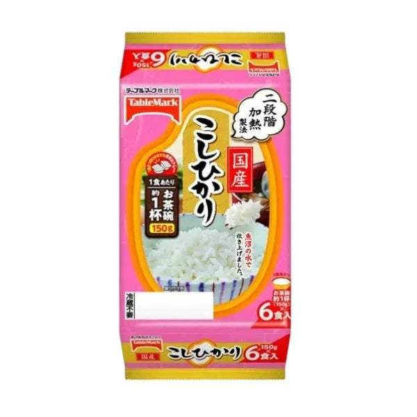 Cooked Koshihikari Japanese rice by TABLEMARK, prepared with Uonuma water, served in a bowl on a clean table.