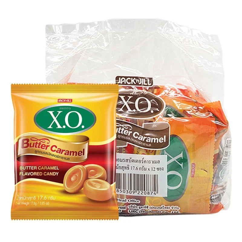 X.O. Butter Caramel Candy 17.6g, close-up of individually wrapped caramel candies in a box, dry grocery snack.