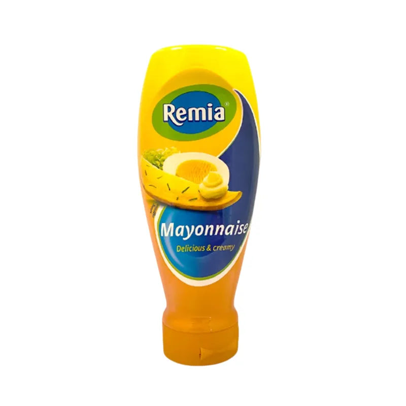 Remia Mayonnaise 500ml bottle, creamy dry grocery condiment with a smooth texture and white appearance.