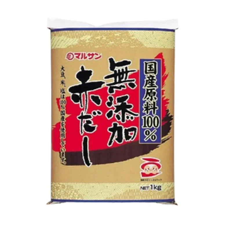 Marusan-ai Mutenka Akadashi Red Miso in a clear plastic bag, additive-free dry grocery product for cooking and seasoning.
