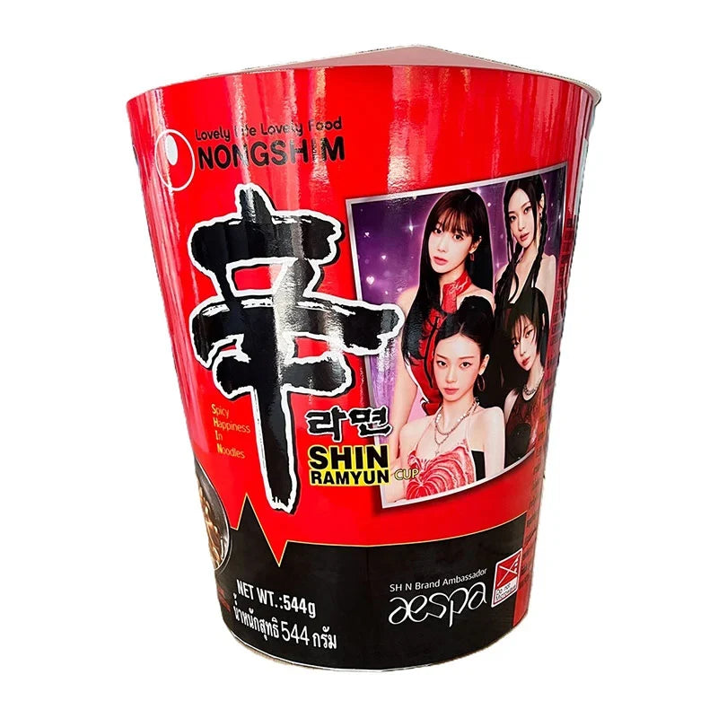 Nongshim Shin Ramyun Giant Cup 544g dry noodle soup in a large cup with spicy broth and noodles visible inside.