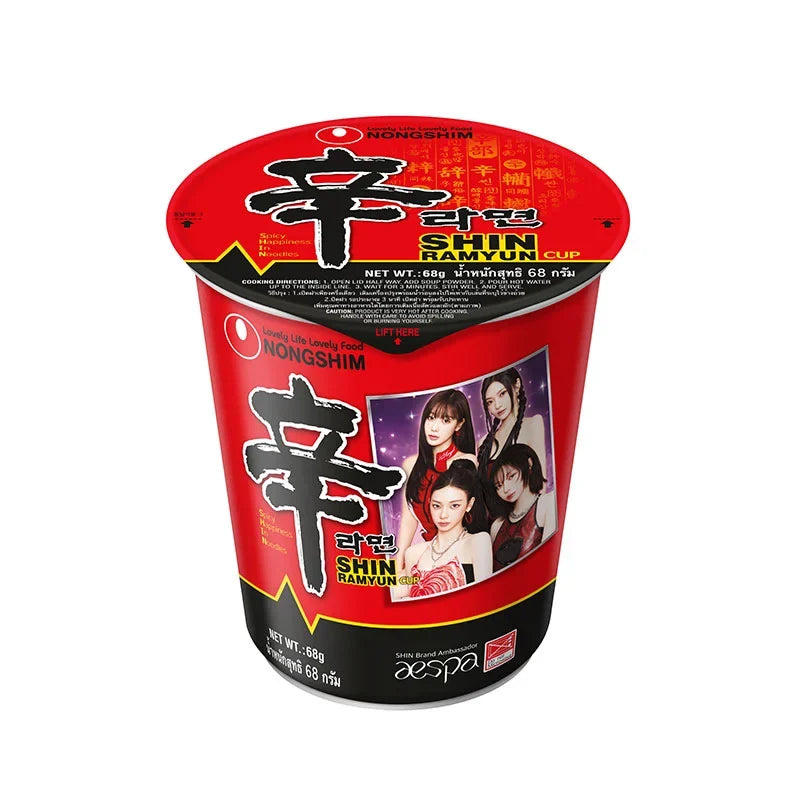 Nongshim Shin Ramyun Giant Cup 544g dry noodle soup in a black cup with red and yellow branding, ready for cooking.