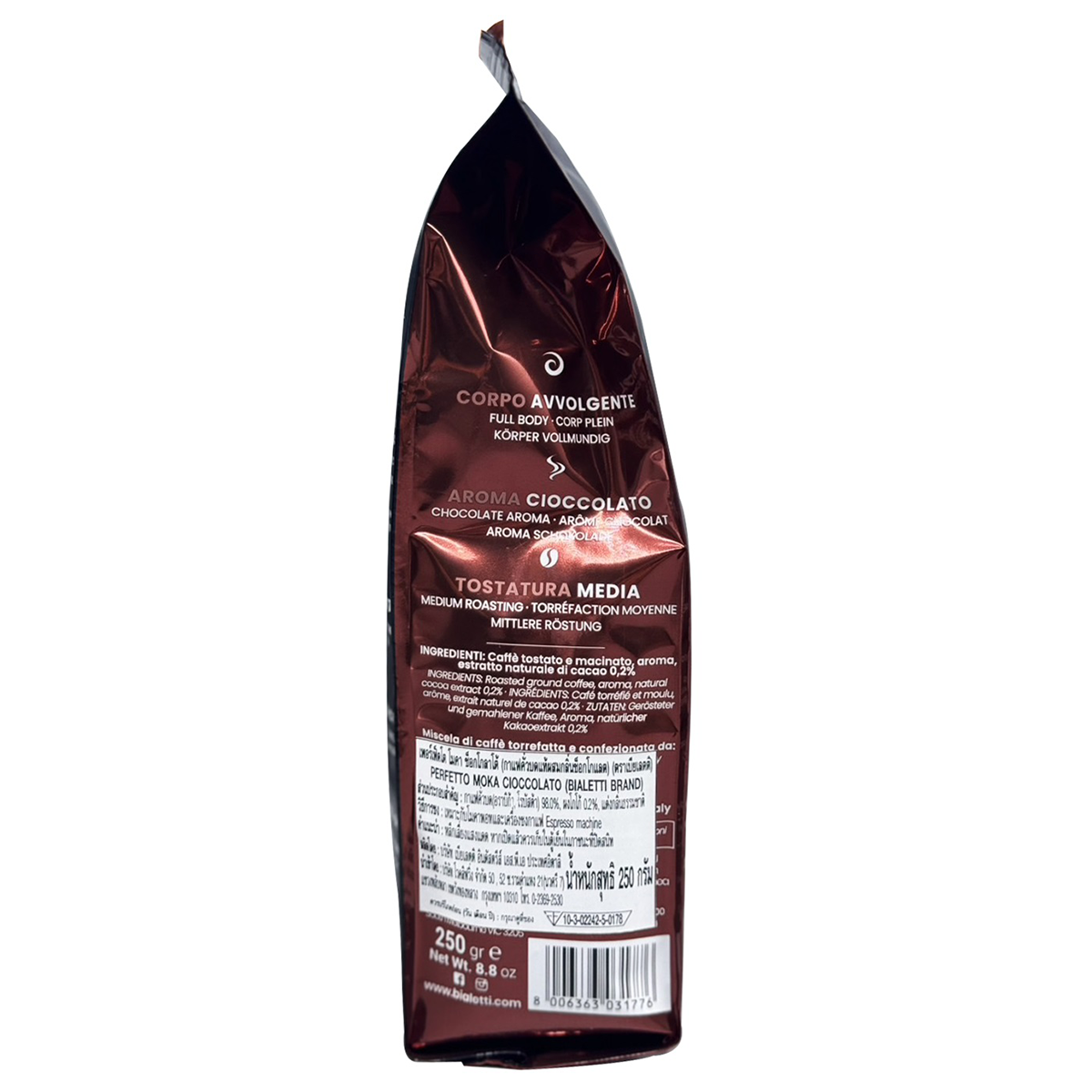 Bialetti Cioccolato drink in a glass cup with a spoon, showcasing the rich chocolate beverage and smooth texture.