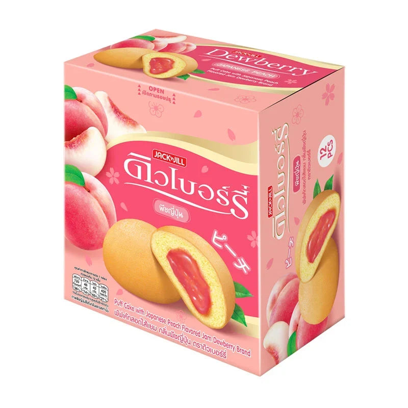 Dewberry Peach Puff Cake snack box with 12 packs of 15g each, featuring peach-flavored puffed confectionery from Dewberry.