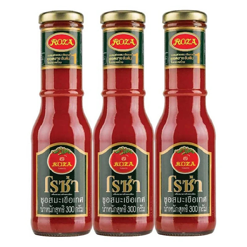 Three bottles of ROZA Tomato Ketchup 300g each, featuring clear labels and red ketchup inside transparent bottles.