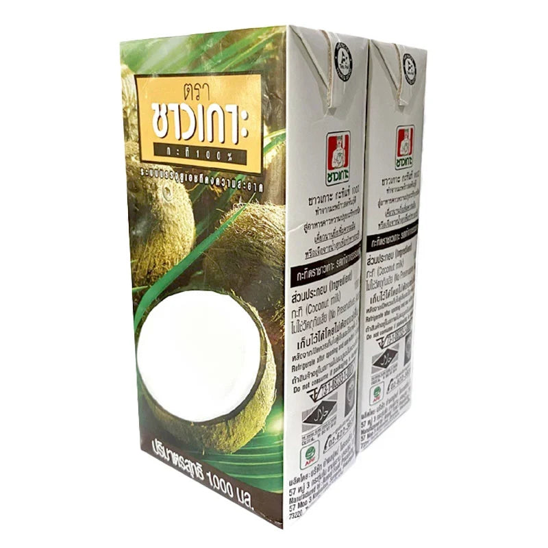 Chaokoh Coconut Milk 1L cartons, Thai brand, shown in a grocery store aisle, ideal for cooking and baking recipes.