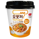 Youngpoong Yopokki Dak Galbi Topokki in a grocery package, showcasing spicy Korean rice cakes with sauce and ingredients.