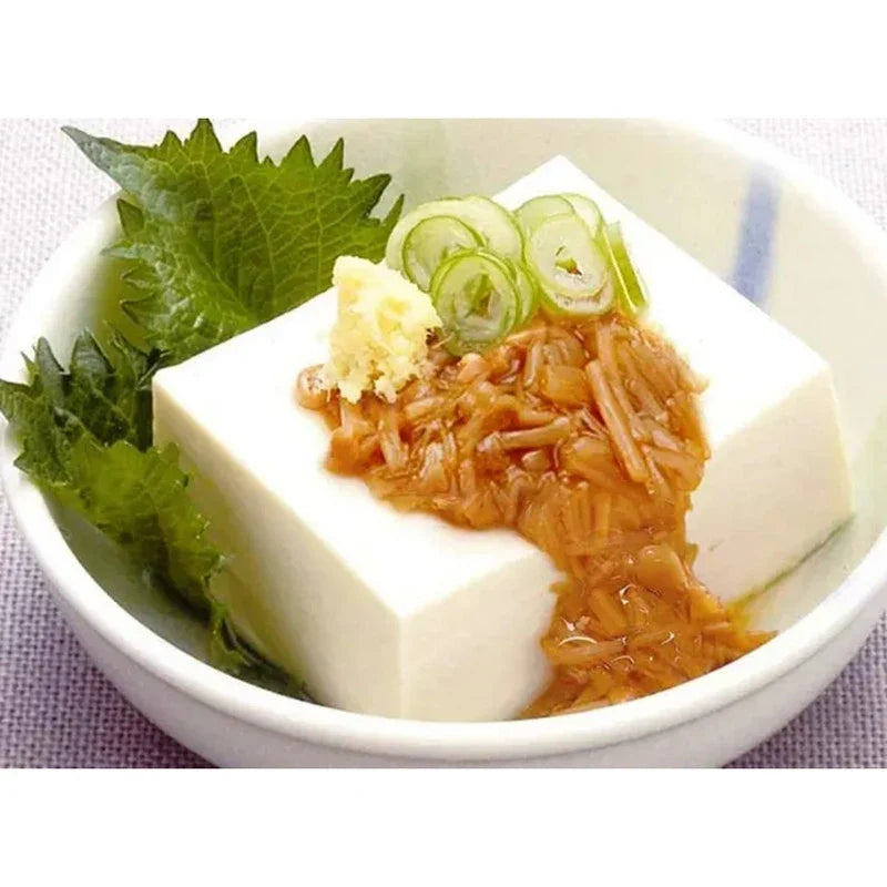 NAGANO TOMATO Nagano Tomato Mushroom Sauce with Enokitake in a glass jar, ready for cooking or serving in dry grocery.