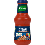 Bottle of Knorr Steak Sauce, a savory grocery condiment with rich flavor, shown in a clear container with a red cap.
