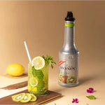 Monin Kiwi Fruit Mix in a 1000ml bottle, ideal for cocktails and beverages, showcasing fresh kiwi flavor in a dry grocery product.