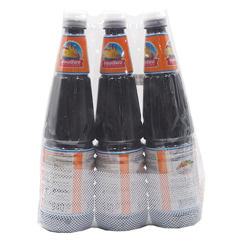 Three bottles of Nguan Chiang Dark Soy Sauce, 940g each, from the NGUAN CHIANG dry grocery brand, shown in a row.