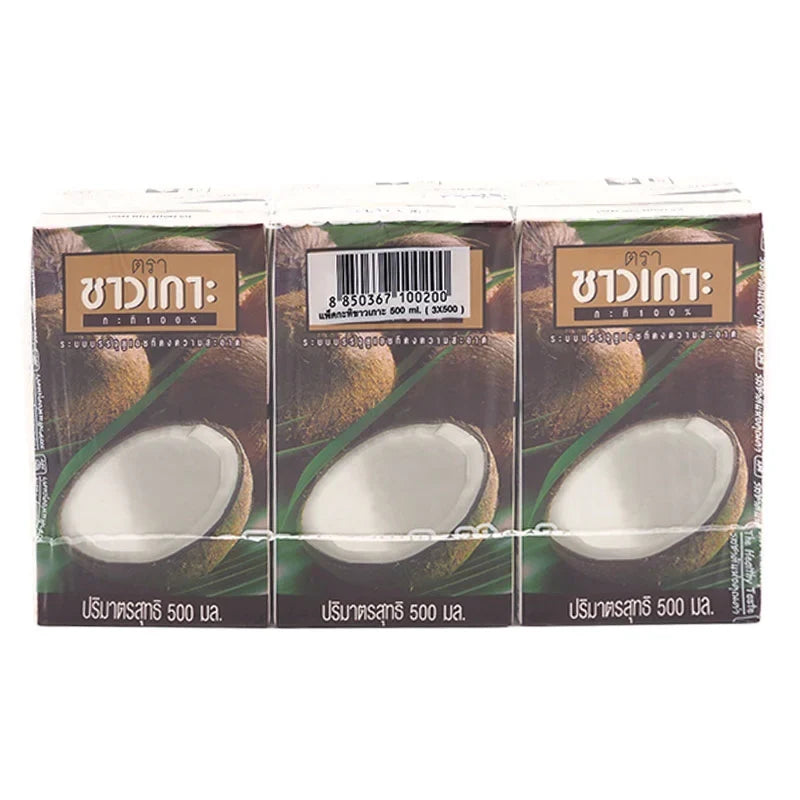 Three 500ml cartons of CHAOKOH Coconut Milk for cooking and baking in a dry grocery setting.