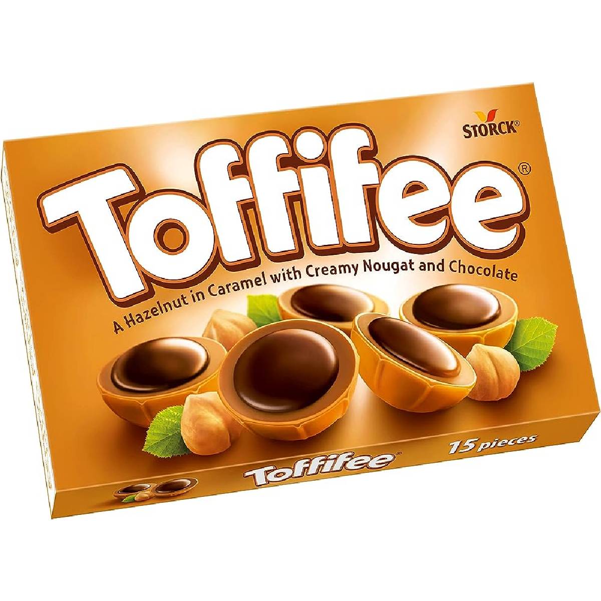 Toffifee chocolate caramel candies in a bowl, showing the caramel, chocolate, and nut filling inside each piece.