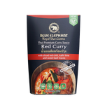 Blue Elephant Thai Red Curry Sauce bottle, vibrant packaging, colorful label showcasing the grocery product for authentic Thai cooking.