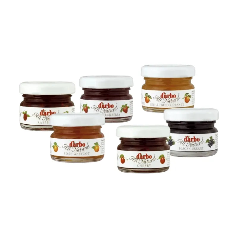 Jar of Darbo Raspberry Jam in a glass container with a label, showcasing the delicious raspberry spread.