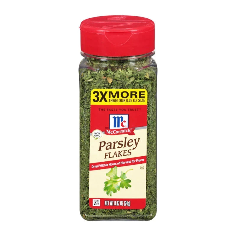 MCCORMICK Parsley Flakes 24g jar, dry grocery product with green dried parsley flakes on the label.