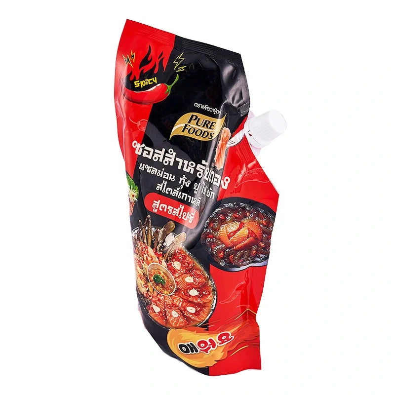 Pure Foods Spicy Marinade Sauce in 800g bottle, ready for flavorful grilling and cooking, dry grocery product from PURE FOODS.