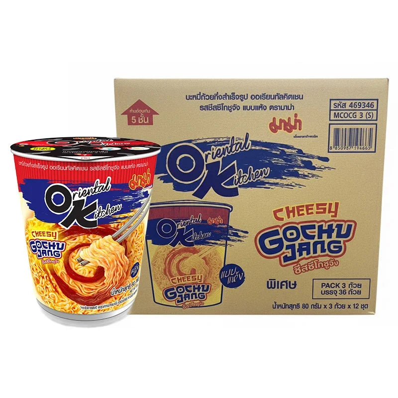 Mama Oriental Kitchen Dried Instant Cup Noodles Cheesy Gochujang flavor in a cup, with noodles and seasoning visible.