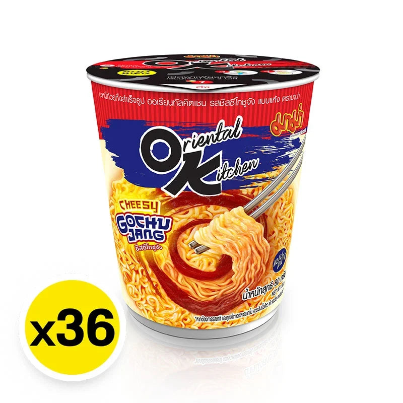 Mama Oriental Kitchen dried instant cup noodles with cheesy gochujang flavor, featuring the cup packaging and noodles inside.
