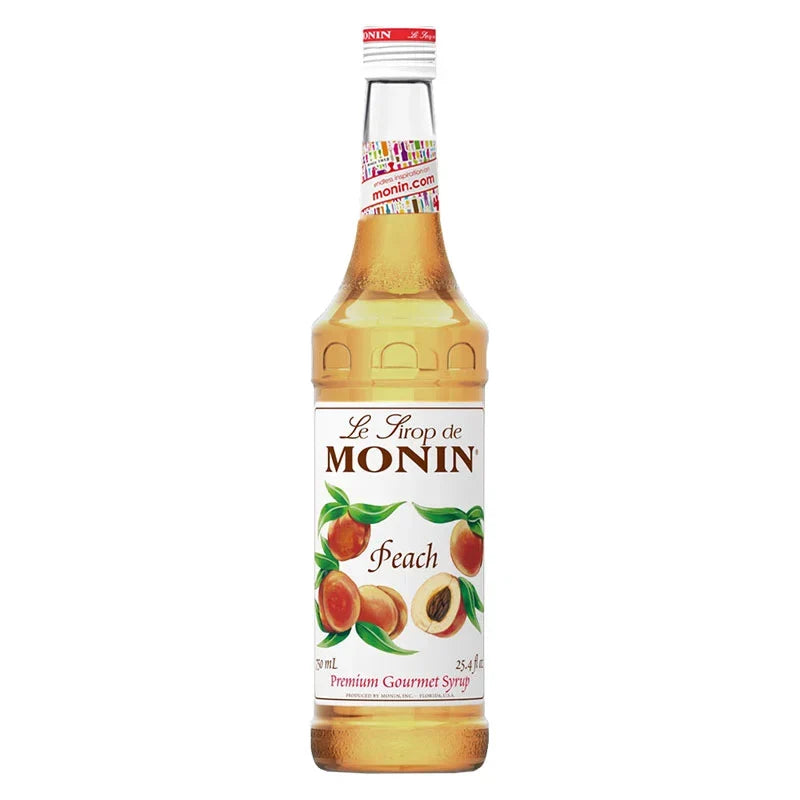 Monin Peach Syrup 700ml bottle for drinks and desserts, shown in a clear plastic container with peach flavor branding.