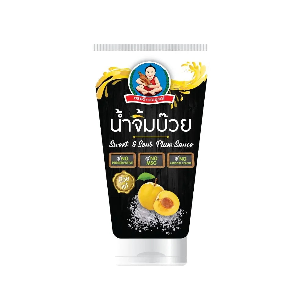 Deksomboon Sweet and Sour Plum Sauce bottle from dry grocery section, featuring clear label and dark plum-colored sauce inside.