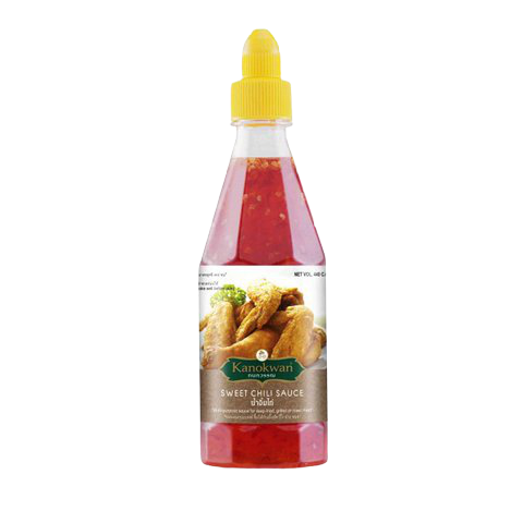 Bottle of Kanokwan Sweet Chilli sauce from the grocery aisle, featuring a red and yellow label and a clear glass container.