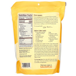Organic whole grain corn flour from Bob's Red Mill's in a resealable bag, showing golden corn flour inside.
