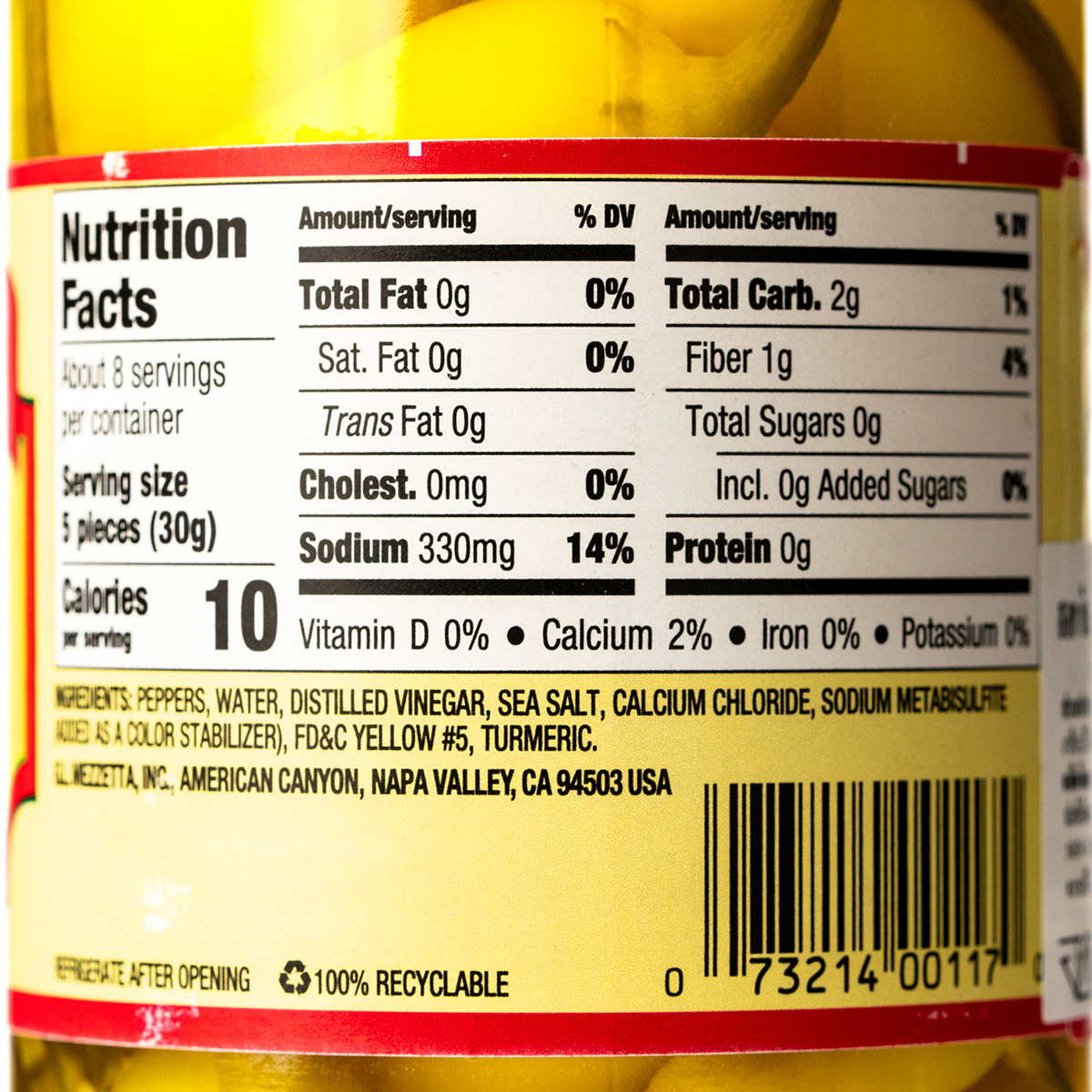 Canned Mezzetta Hot Chili Peppers in a jar, healthy grocery item with vibrant red and green chili peppers visible in the image.