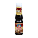 Deksomboon Mushroom Soy Sauce 150ml bottle, traditional Asian dry grocery condiment with rich mushroom flavor.