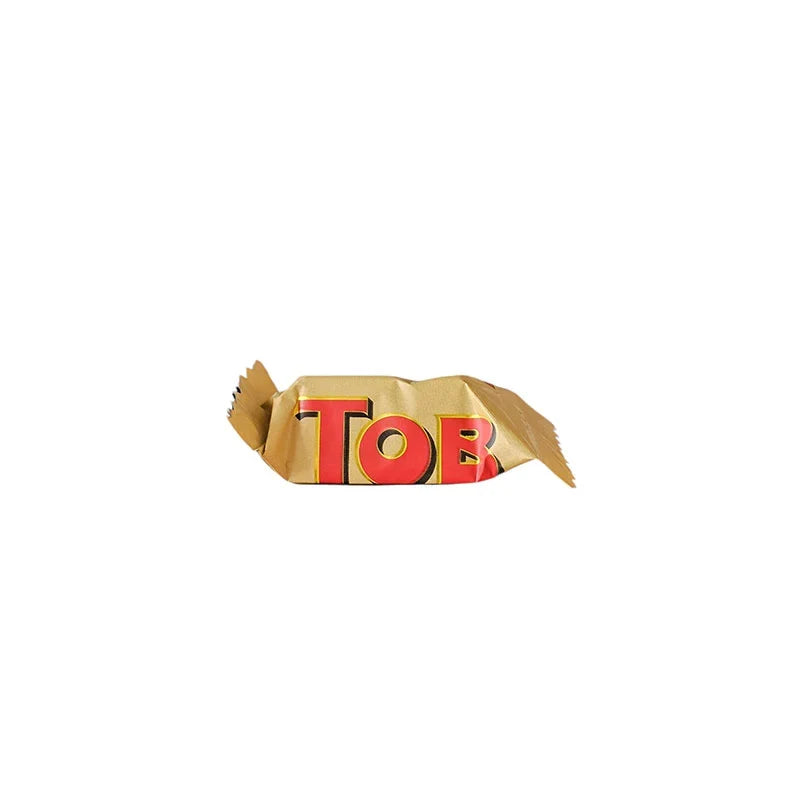 Toblerone Chocolate Milk Festive Tin 152g, featuring iconic triangular milk chocolate bars in a decorative holiday tin.