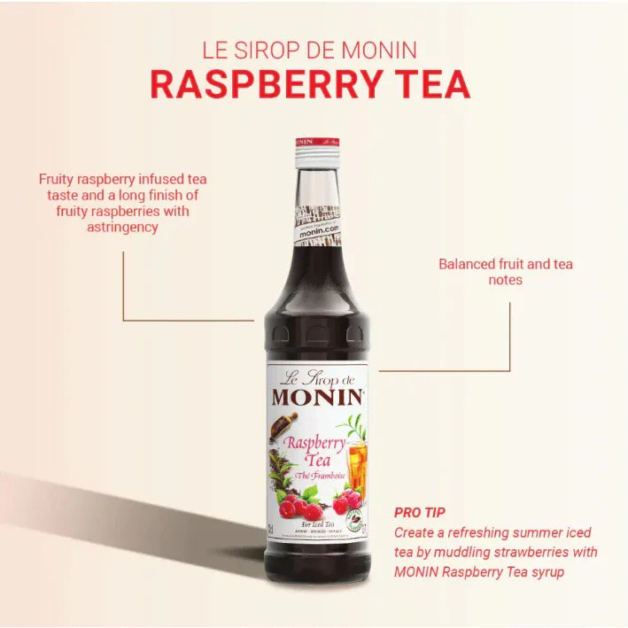 Bottle of Monin Raspberry Tea Syrup 700ml for dry grocery, featuring a clear label and a dark pink liquid inside.