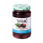 Selia Calamata Greek olives in a bowl, showcasing dark, glossy olives with a textured surface, ready for snacking or cooking.