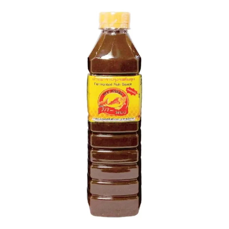 Bottle of PA-THONG Patong Fermented Fish Sauce 500ml for dry grocery cooking, featuring the label and transparent container.