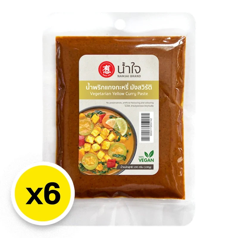 Namjai Yellow Curry Paste 100g, dry grocery product, showing six packets of bright yellow curry paste from the NAMJAI brand.